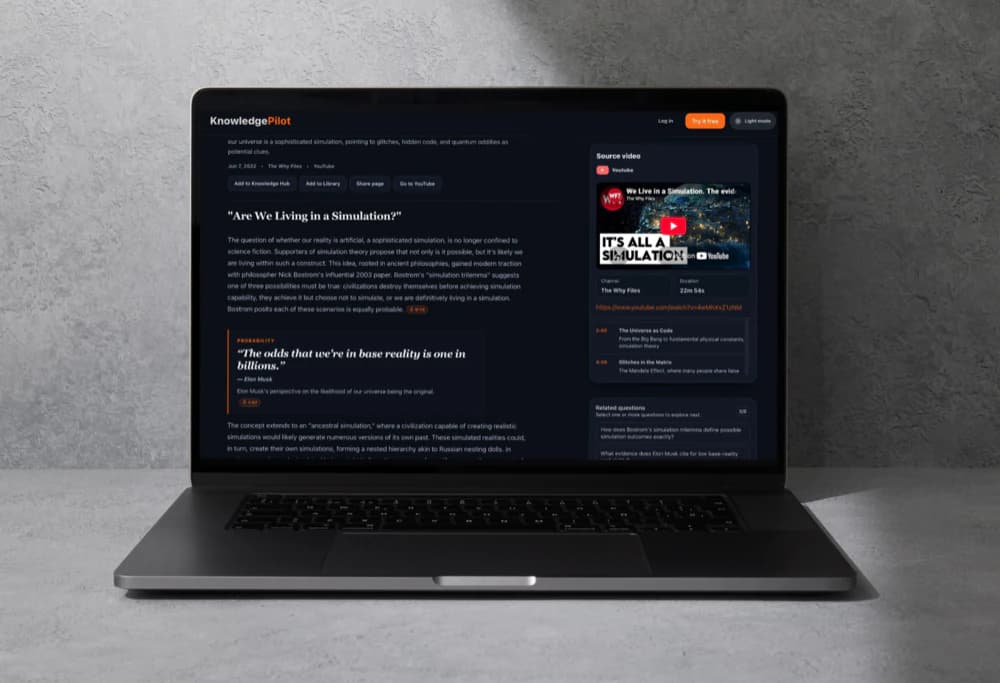 Article on a laptop with the source video player and chapter links alongside, by KnowledgePilot