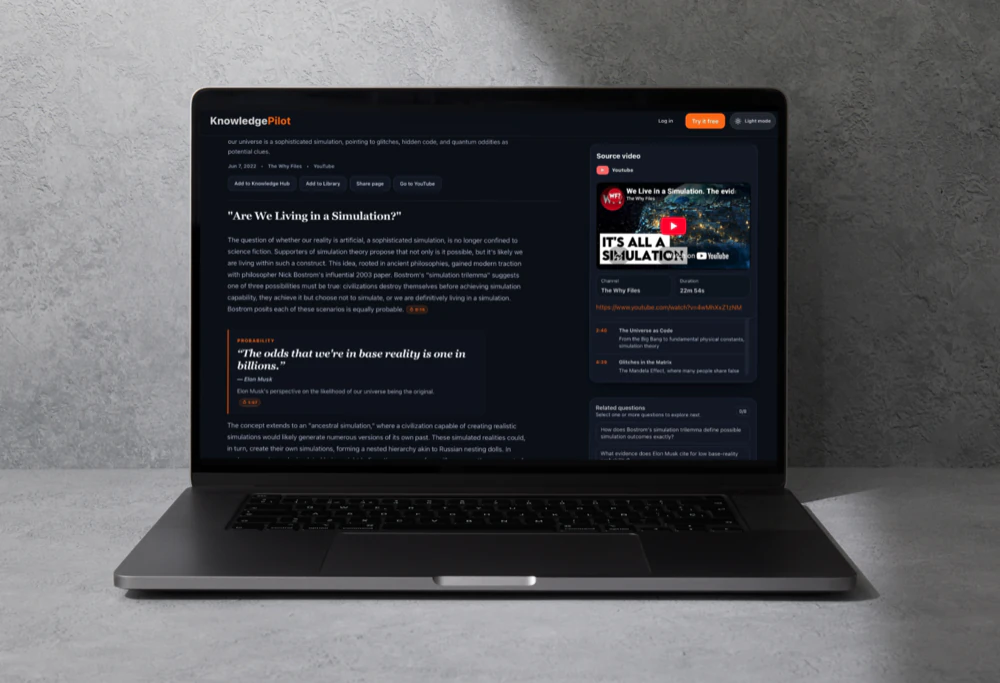 Article on a laptop with the source video player and chapter links alongside, by KnowledgePilot